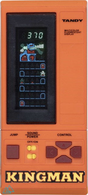 Top view dedicated video game handheld console Tandy Kingman